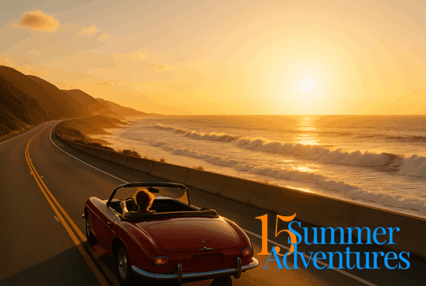 a red convertible speeds down a coastal highway with waves crashing in the distance.